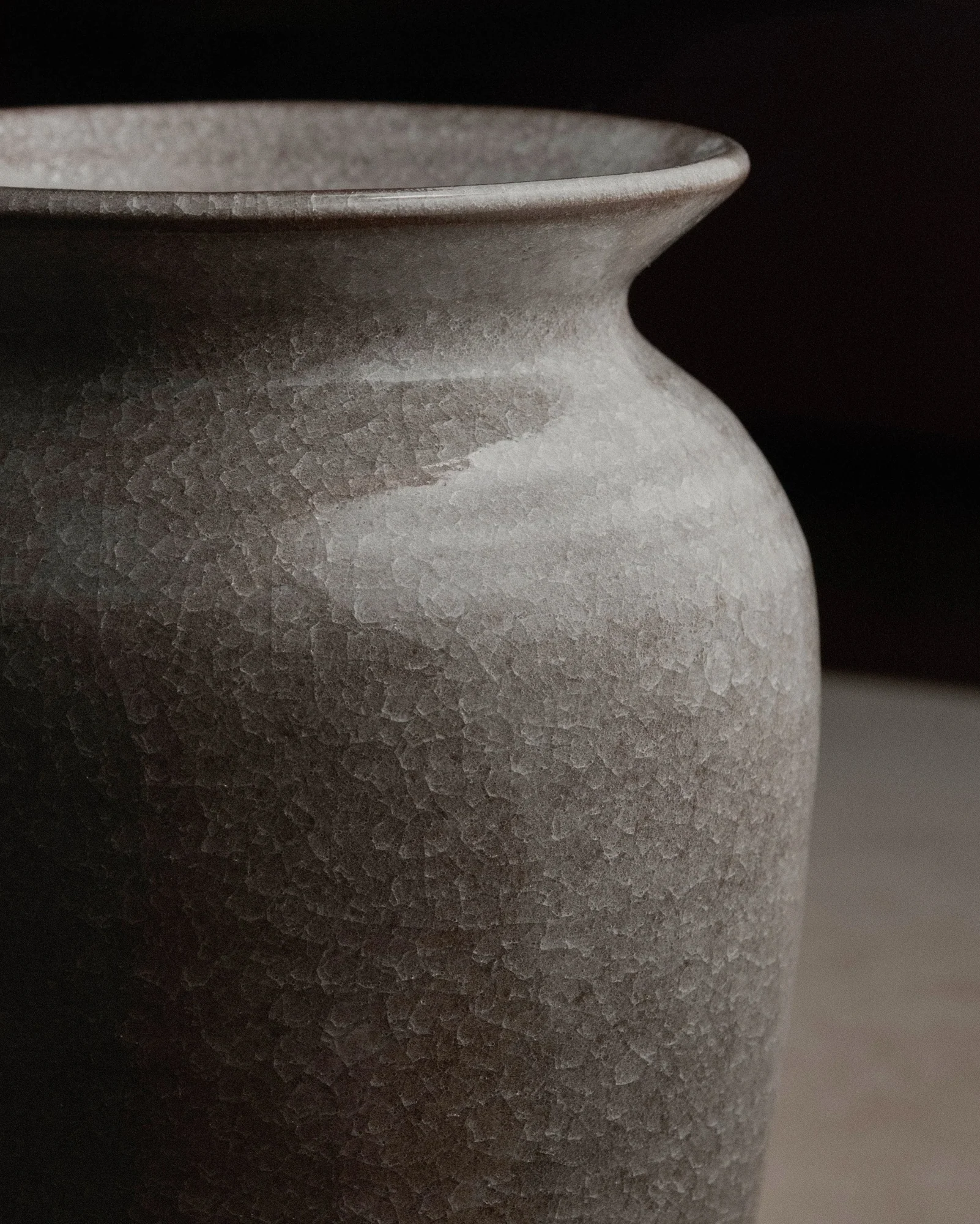 Close-up of a vase with a snowflake glaze. Made for @kramer_und_kramer 

Photo by Daniela Trost @danielatrost 

#ceramics #vase #handmade