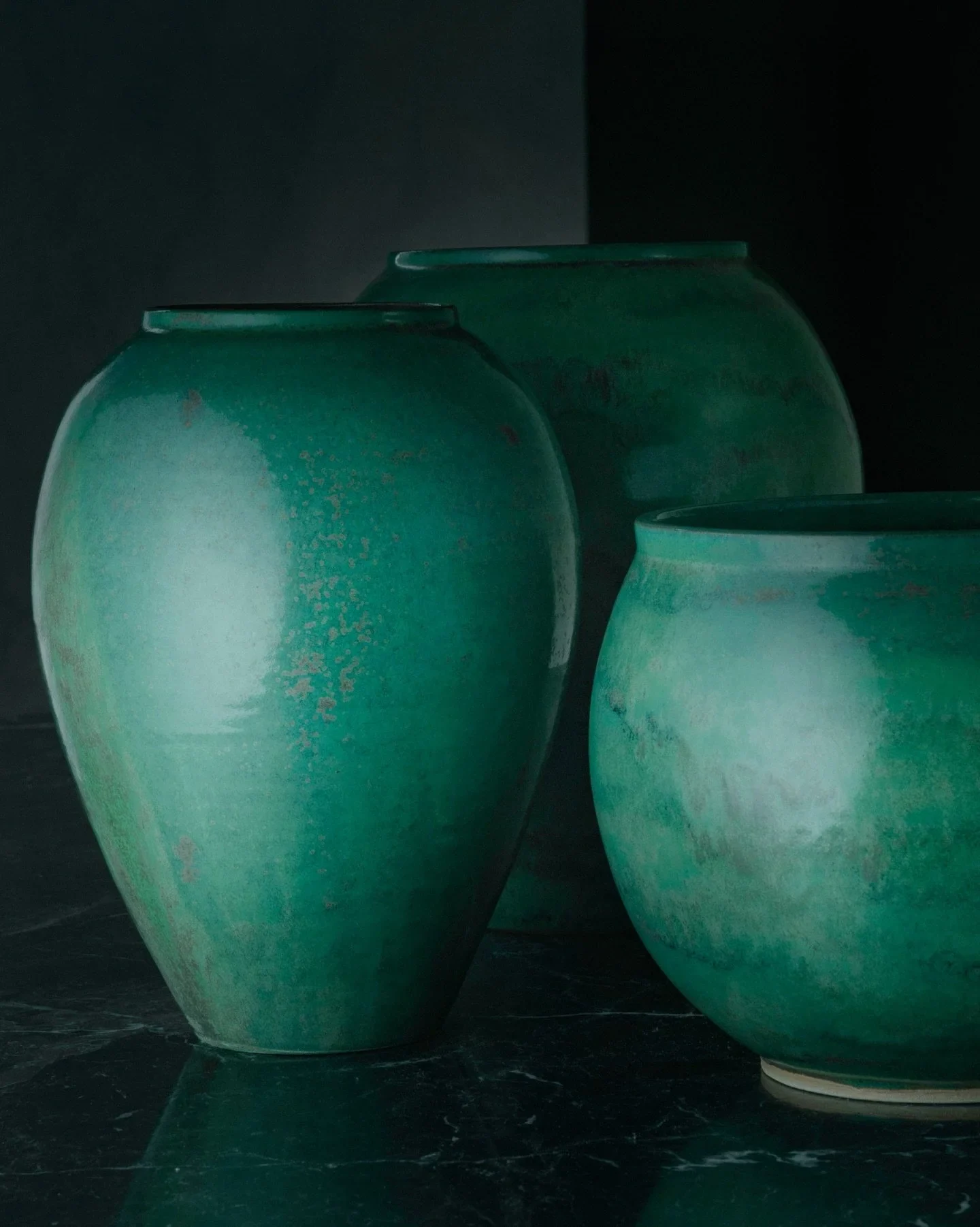 Close-up of shapes and textures of vases and planters, made for @kramer_und_kramer
Custom-developed jade glaze.

Photo by @danielatrost 

#ceramics #handmade #interiordesign