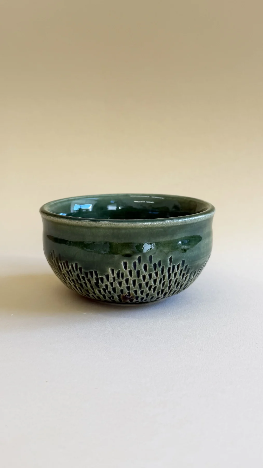 Carved green bowl made by Rahel